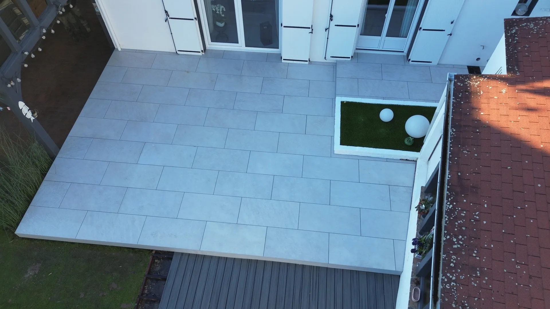 Pose terrasse composite Terrasteel — Main Verte